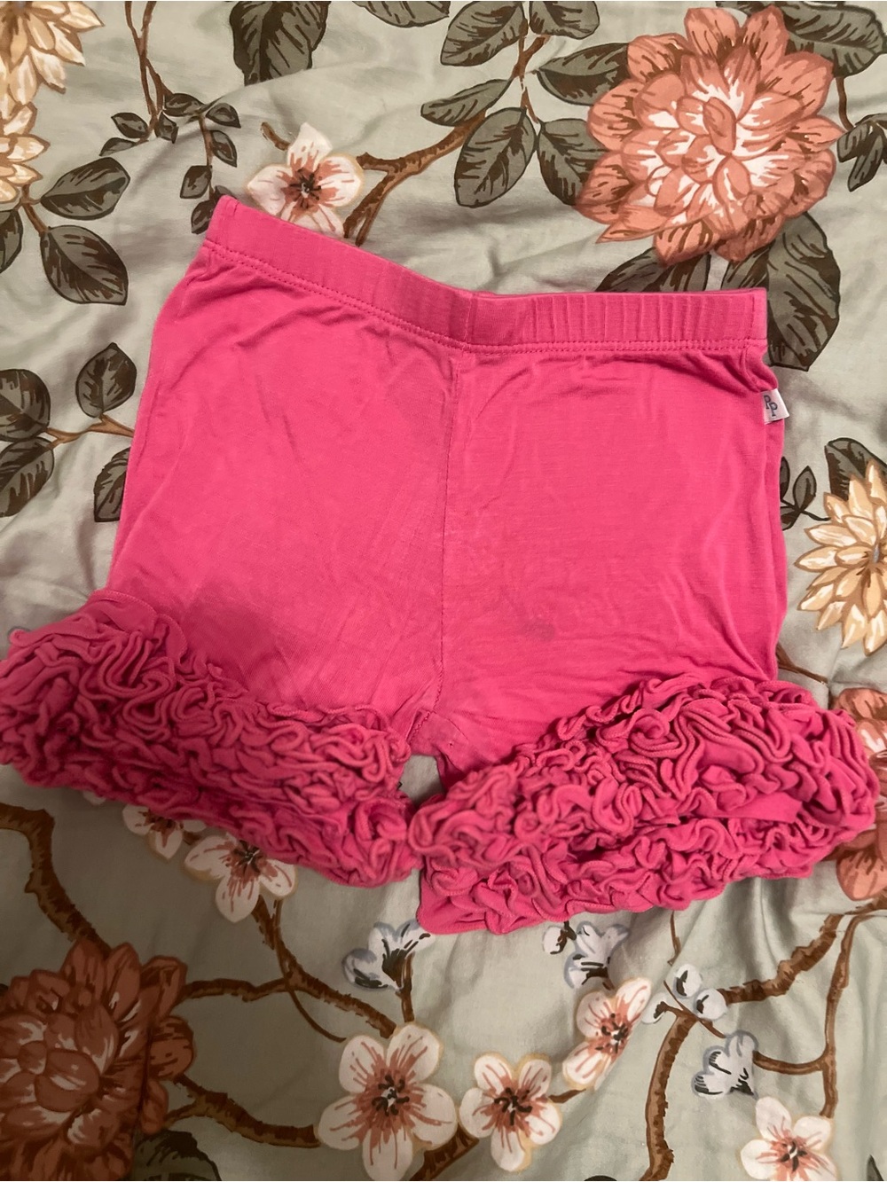 Posh Peanut Girls Pink Ruffle Hem Shorts